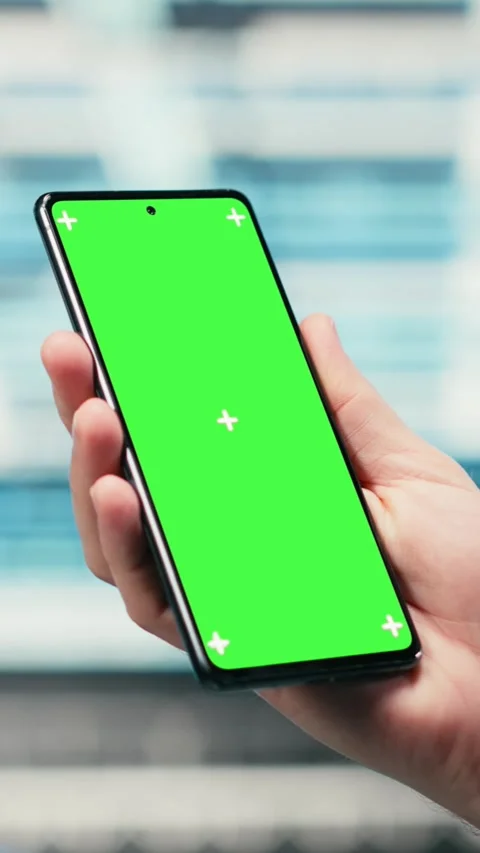 Vertical video Green screen smartphone used by data center admin managing Stock Footage 329590765