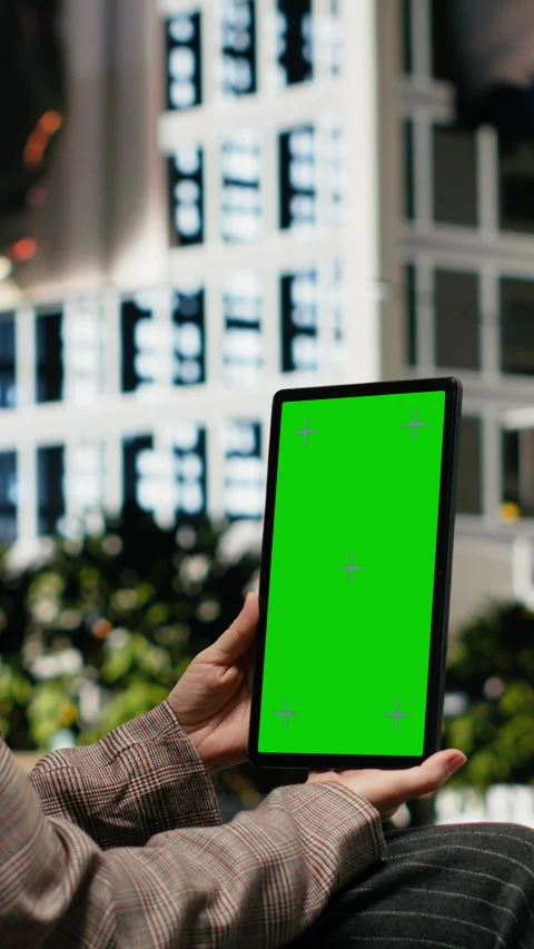 Vertical video Green screen tablet used by businesswoman on park bench Stock Footage 343560709