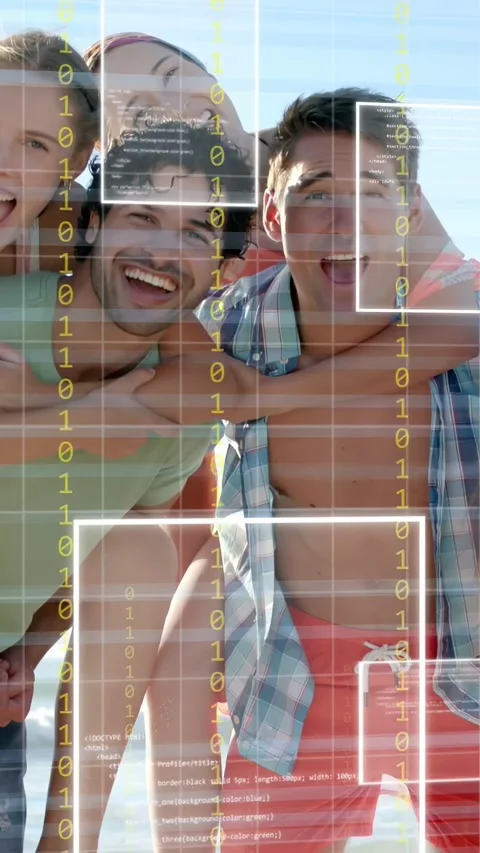 Vertical video: Group posing on shore, grid appearing with binary HUD animating Stock Footage 333777138