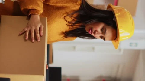 Vertical video: Group of workers checking merchandise in packages Stock Footage 233219990