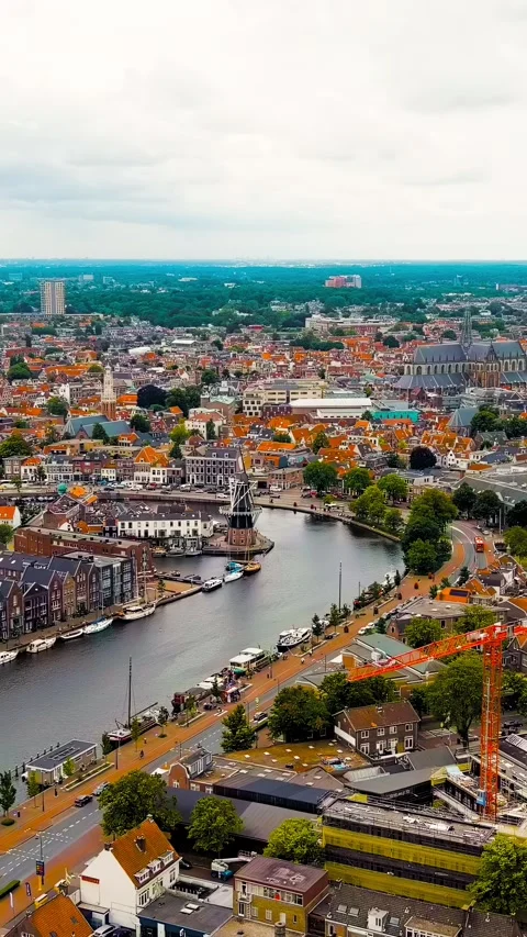 Vertical video. Haarlem, Netherlands. Windmill De Adriaan (1779). Windmill from Stock Footage 296275686
