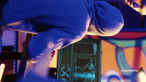 Vertical video Hacker teaching youngster to hack PCs Stock Footage 255913573