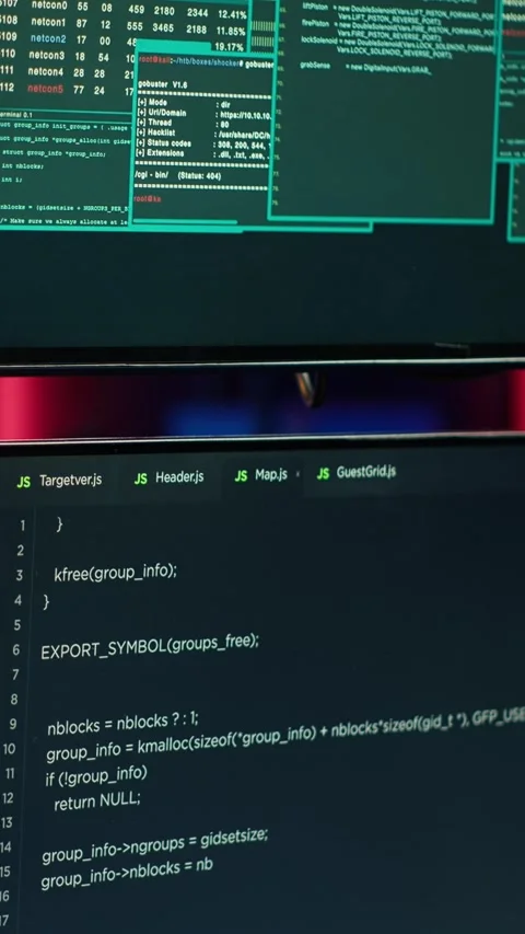 Vertical video Hacking malware programming script on monitors in underground Stock Footage 275620244