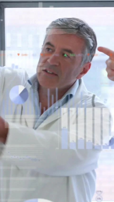 Vertical video: Hand entering and pointing, lead explaining lab data on glass Stock Footage 330580569