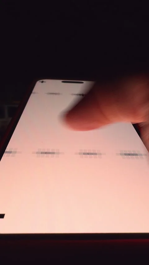 Vertical video. Hand Holding Smartphone with Tracking Marks While Swiping Screen Stock Footage 320733810