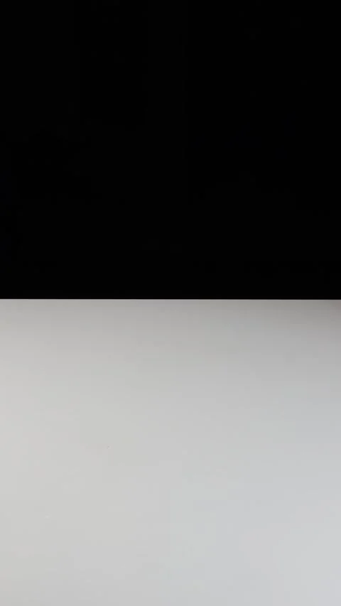 Vertical video. hand with light pink nails placing an empty clear drinking glass Stock Footage 306157082