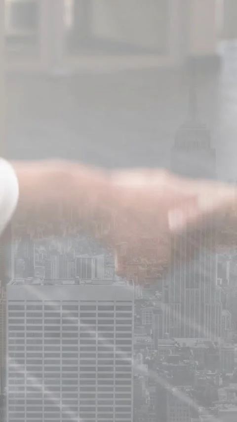 Vertical video: Hands meeting, exchanging card for business, briefly shaking Stock-Footage 334605276