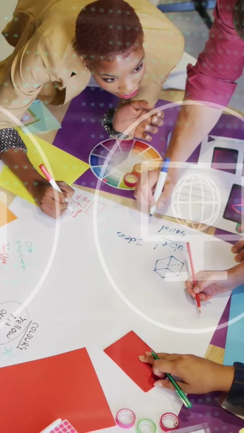 Vertical video: Hands reaching starting design, woman guiding team over poster, Stock Footage 333821278