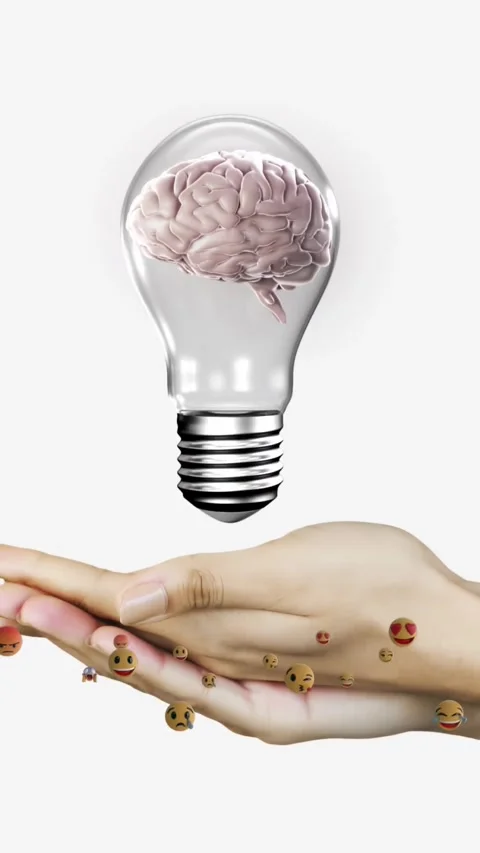 Vertical video: Hands sliding cupping as falling brain bulb centering drifting Video stock 330430183