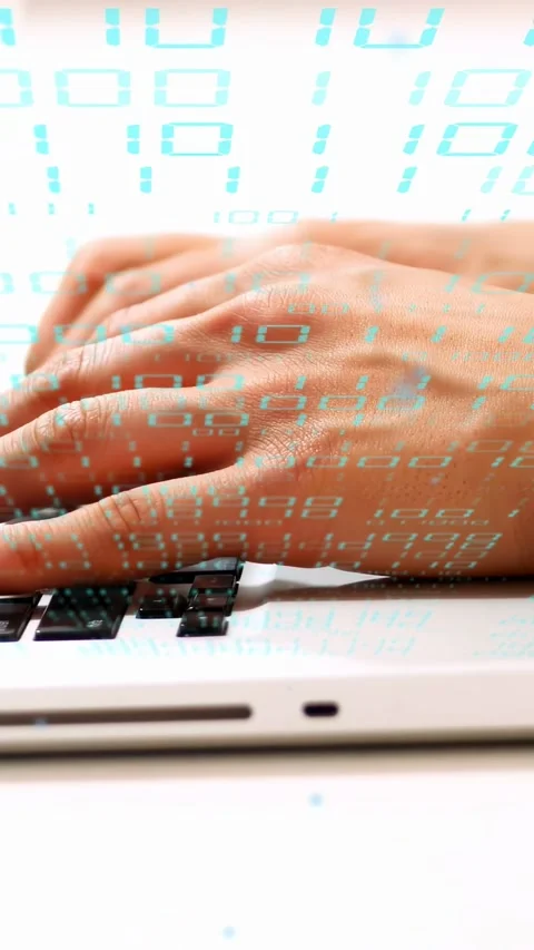 Vertical video: Hands typing on laptop, initiating cyan overlay for coding, Stock Footage 334694946