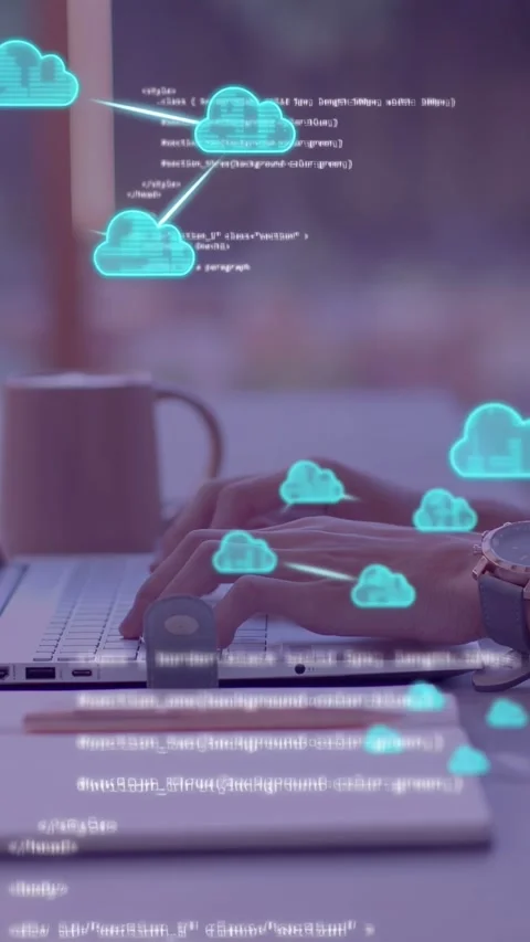 Vertical video: Hands typing on laptop, generating code and cloud icons drifting Stockbeeldmateriaal 335507624