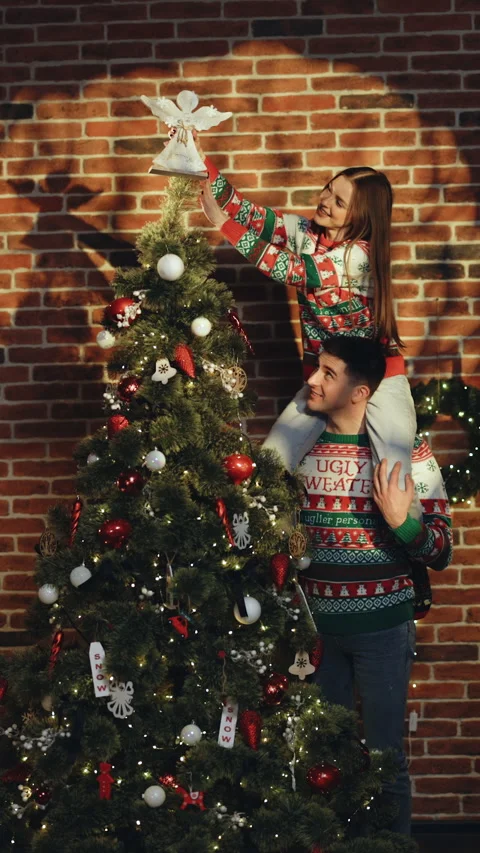Vertical video of happy couple preparing for New Year winter holidays Stock Footage 304129277