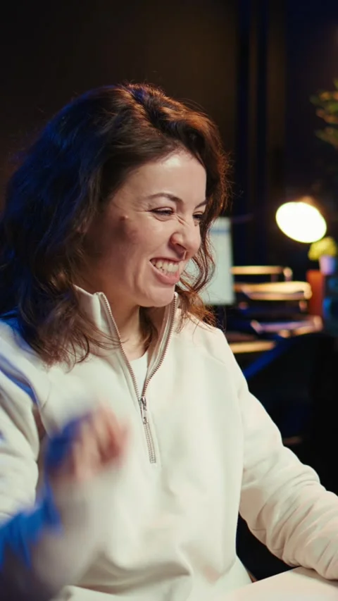 Vertical video Happy developer celebrating after managing to secure company Stock Footage 283506597