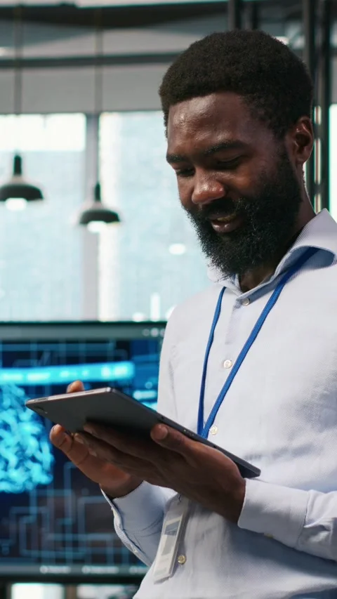 Vertical video Happy programmer designing and developing software applications Stock Footage 312768105