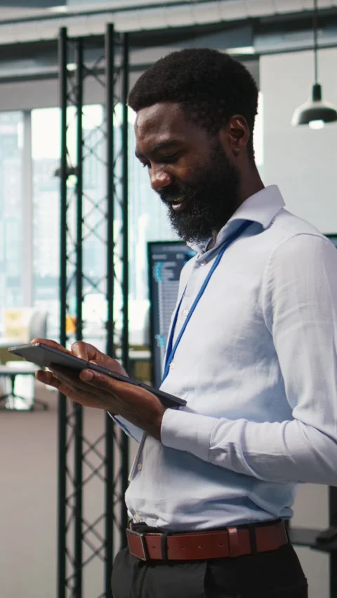 Vertical video Happy programmer designing and developing software applications Stock Footage 312768156