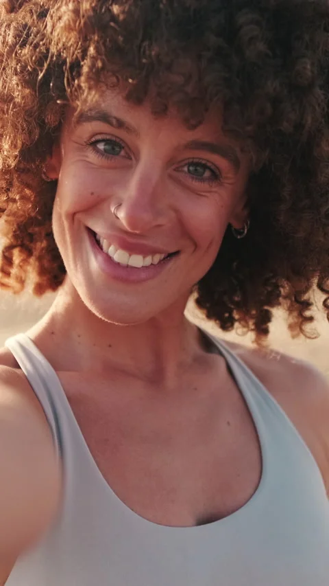 Vertical video, Happy Woman's Beach Selfie After Workout Stock Footage 312640105
