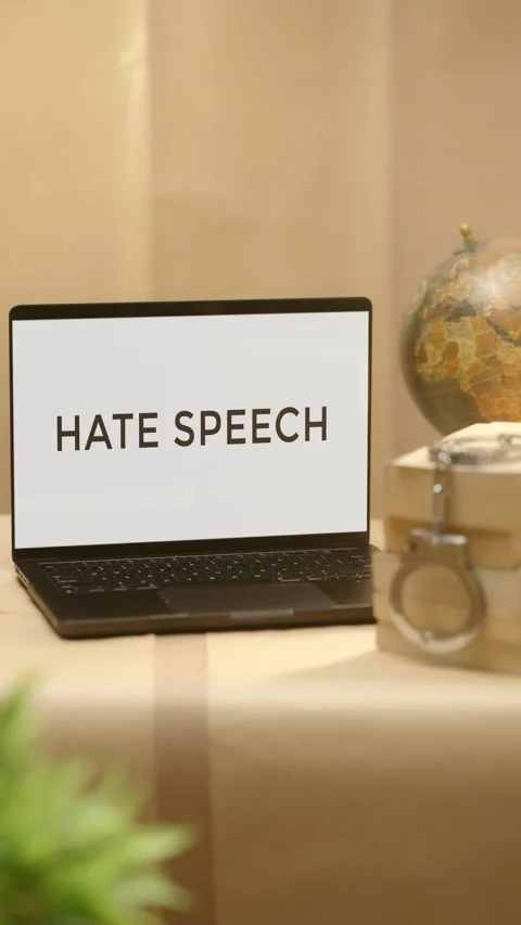 VERTICAL VIDEO OF HATE SPEECH DISPLAYED IN LEGAL LAPTOP SCREEN Stock Footage 308098441