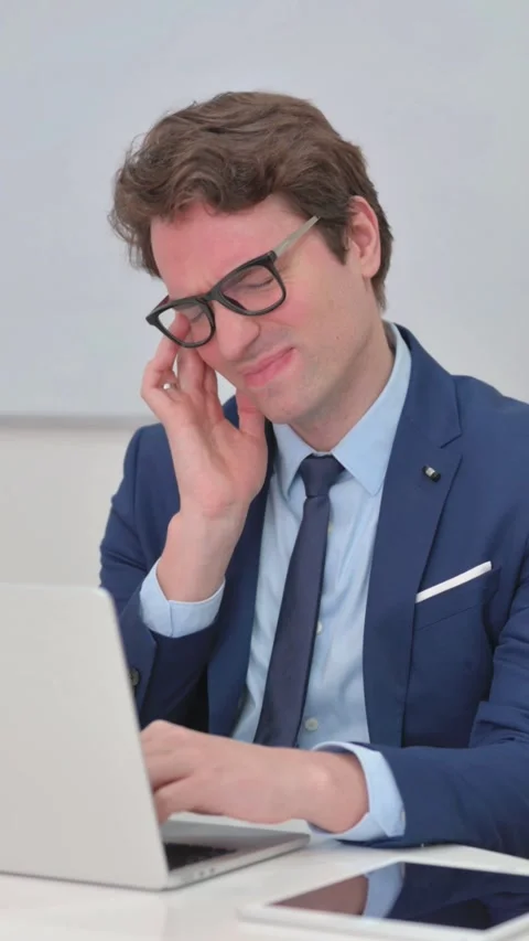 Vertical Video, Headache at Work for Mature Adult Businessman Typing on Laptop Stock Footage 318050272