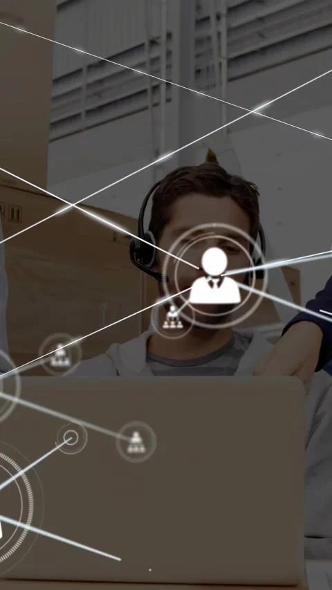 Vertical video: Headset tech using laptop in ops HUD avatar expanding nodes Stock Footage 330395525