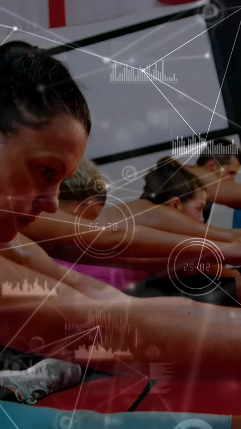 Vertical video: Health class front woman reaching on mats camera zooming HUD Stock Footage 330982194