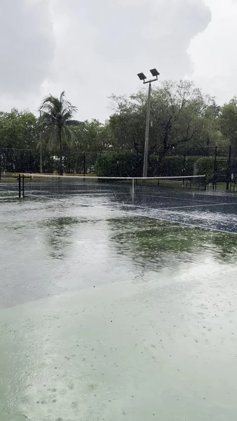 Vertical Video, Heavy Rain on Empty Tennis Court, Hurricane Storm Miami, 4K Stock Footage 341366725
