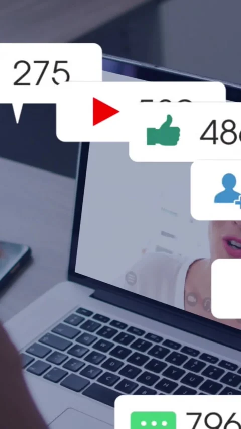 Vertical video: Host on laptop getting mail, social alerts growing and obscuring Stock Footage 331030378