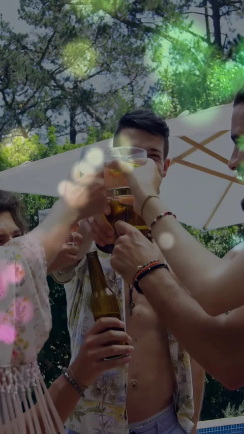 Vertical video: Host lifting beer, friends raising drinks pool at event table, Stock Footage 331291500
