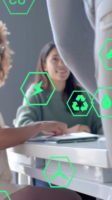 Vertical video: Host reaching, team sharing notes while green hex icons over Stock Footage 333181855