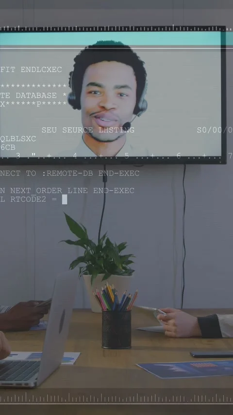 Vertical video: Host talking in office causing text glitch covering screen while Stock Footage 337538821