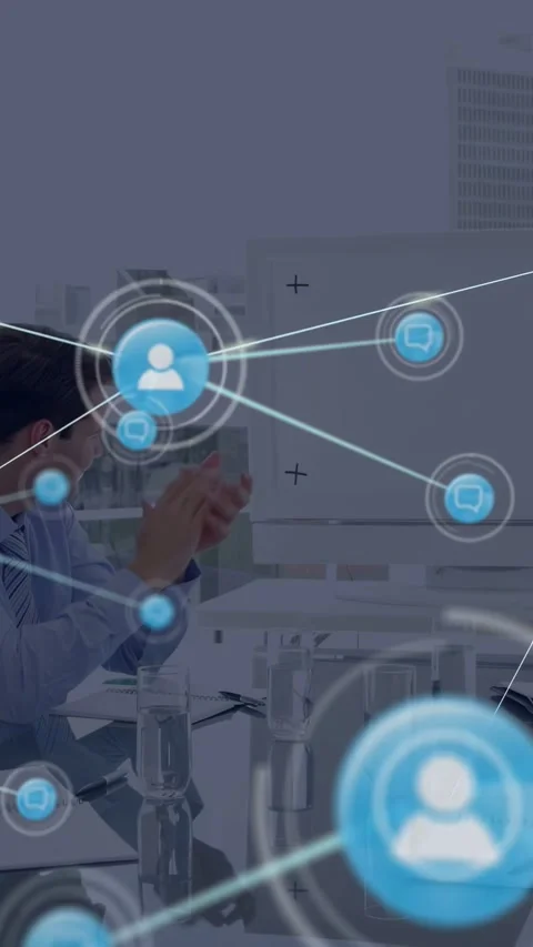 Vertical video: HUD appearing as man clapping in biz meeting, node linking users Stock Footage 332775951