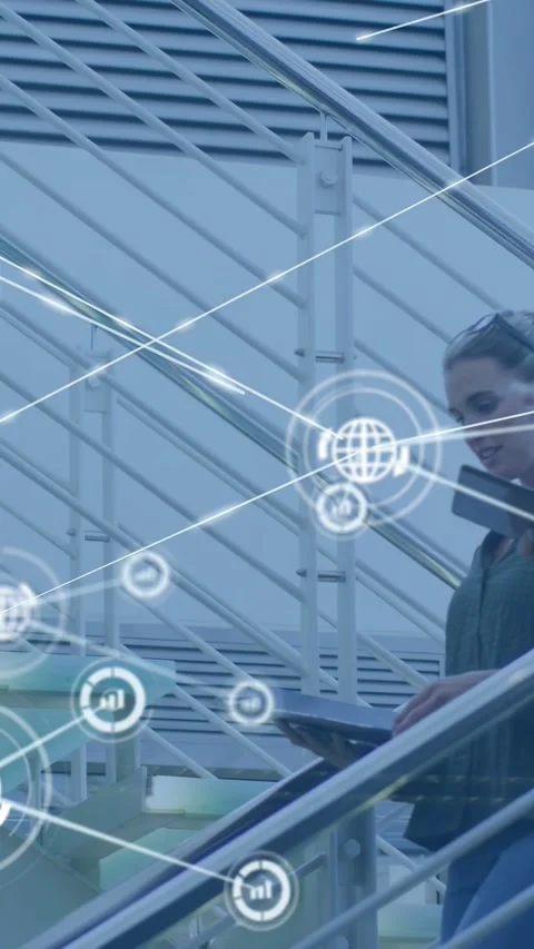 Vertical video: HUD emitting lines, woman using tab and man checking phone Stock Footage 332984991