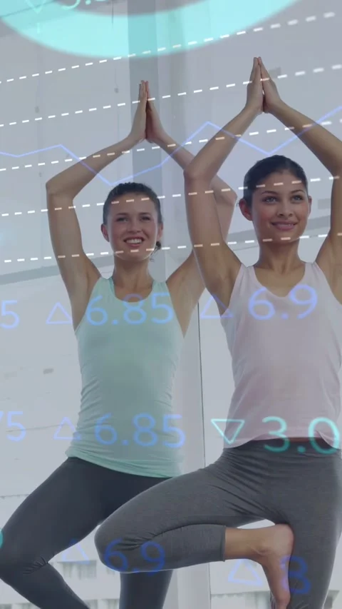 Vertical video: HUD starting to scroll, two women holding tree pose, adjusting Stock Footage 332735174