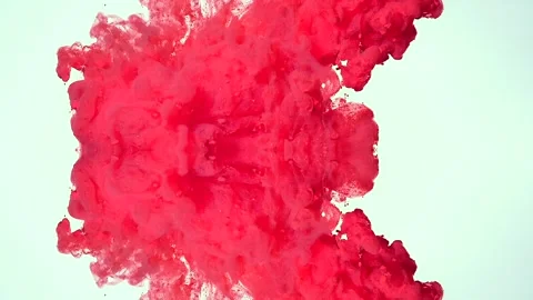 Vertical video with hypnotic pink ink. A scarlet cloud Stock Footage 317796606