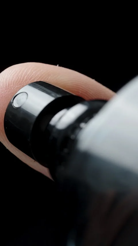 Vertical video. I Spray Perfume from a Black Bottle. Self-Care Concept. Slow-Mot Vidéo 255223215