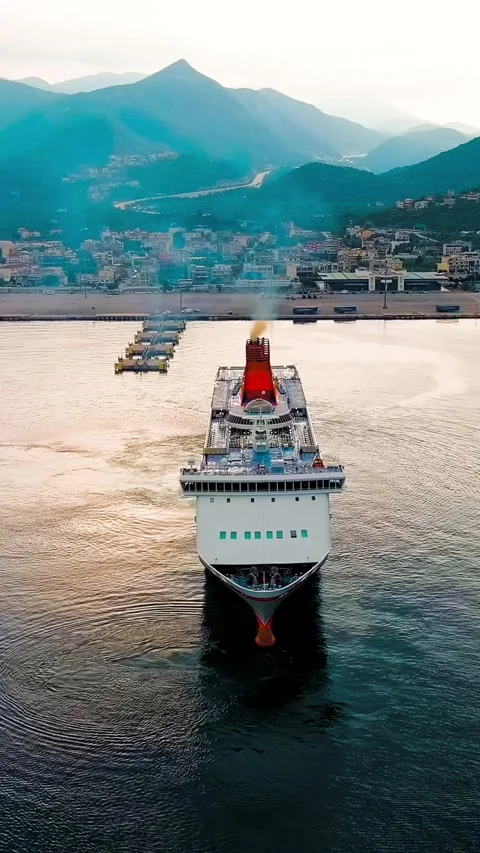 Vertical video. Igoumenitsa, Greece. Large ferry moored for unloading at the 動画素材 293279327