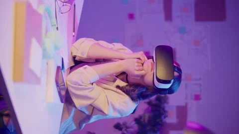 Vertical Video Immersive Learning, EdTech, Neon Mood. Girl Studies in VR Glasses Stock Footage 307644756