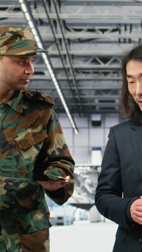 Vertical video Increasing microchips production, defense systems and soldier Stock Footage 333614980