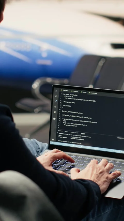 Vertical Video Independent developer, coding program, and reviewing binary data Stock Footage 333612545