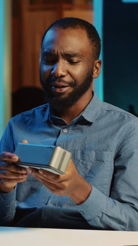 Vertical video Influencer reviews Bluetooth speaker Stock Footage 253252449