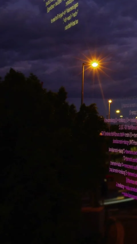 Vertical video: Initial code overlay appearing drifting right, showing lit Stock Footage 329552836