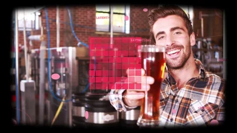 Vertical video: Inspecting pint, man in plaid shirt offering toast at brewery Stock Footage 331713610