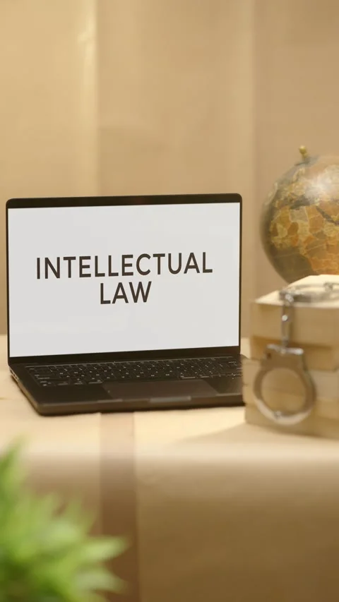 VERTICAL VIDEO OF INTELLECTUAL LAW DISPLAYED IN LEGAL LAPTOP SCREEN Video stock 308098958