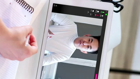 Vertical video internet learning woman man tablet Stock Footage 255113923