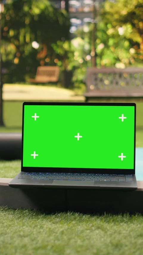 Vertical Video Isolated chroma key on laptop near yoga equipment for outdoor Stock Footage 346615895