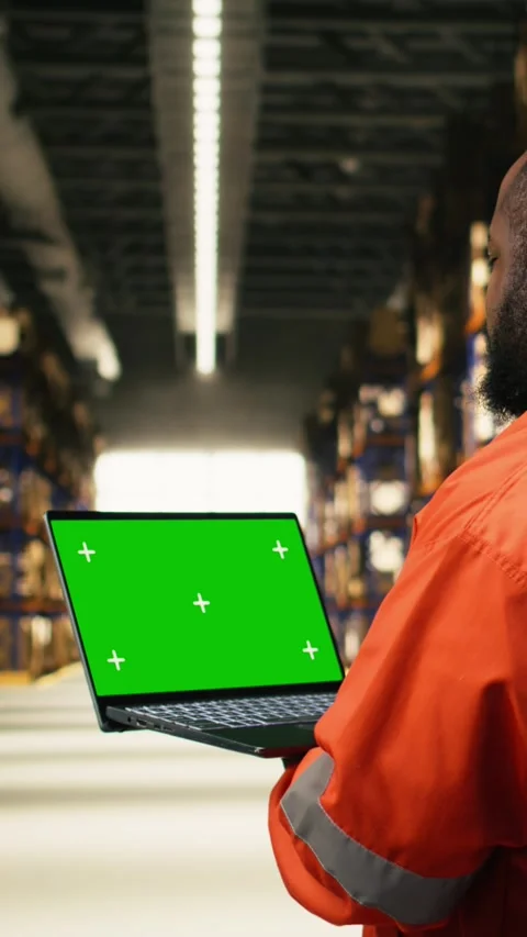Vertical Video Isolated mockup on laptop PC with black worker in industrial Stock Footage 333090131
