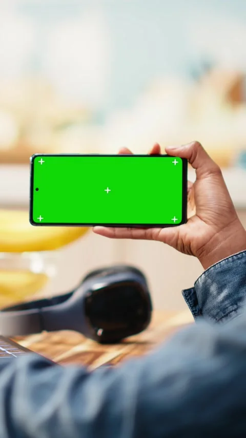 Vertical Video Isolated mockup on mobile phone screen used at home in kitchen Stock Footage 344531176
