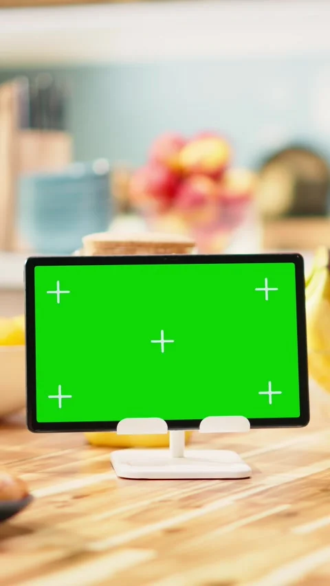 Vertical Video Isolated mockup screen on tablet screen in sunlit kitchen at Stock Footage 344531155