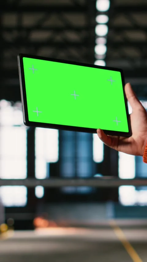 Vertical Video Isolated mockup on tablet held by engineer with helmet in Stock Footage 330138657