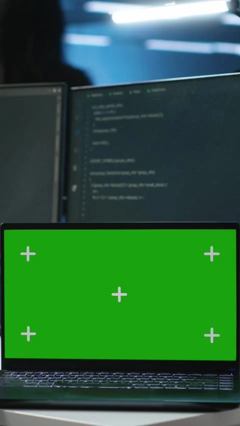 Vertical video Isolated screen laptop next to programmer coding in server farm Stock Footage 276139096