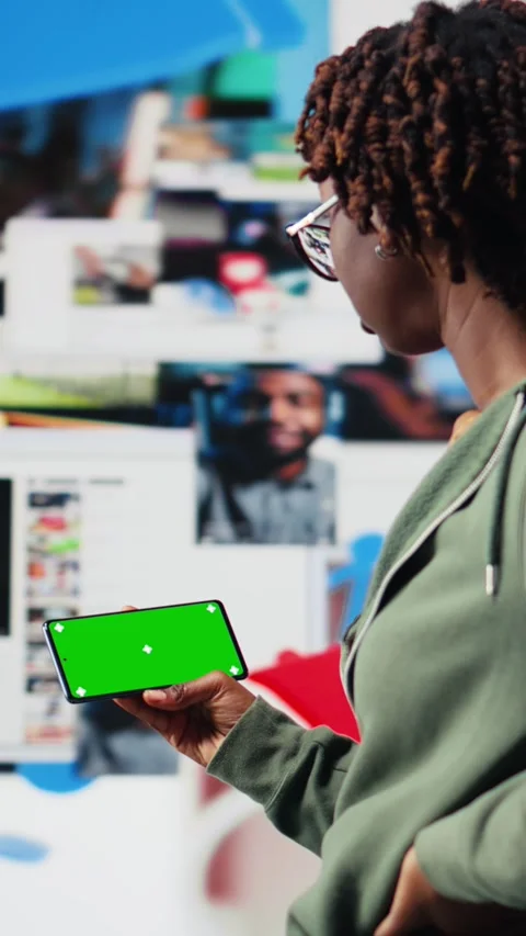 Vertical video Isolated screen mobile phone used by person to look at internet Stock Footage 318685014